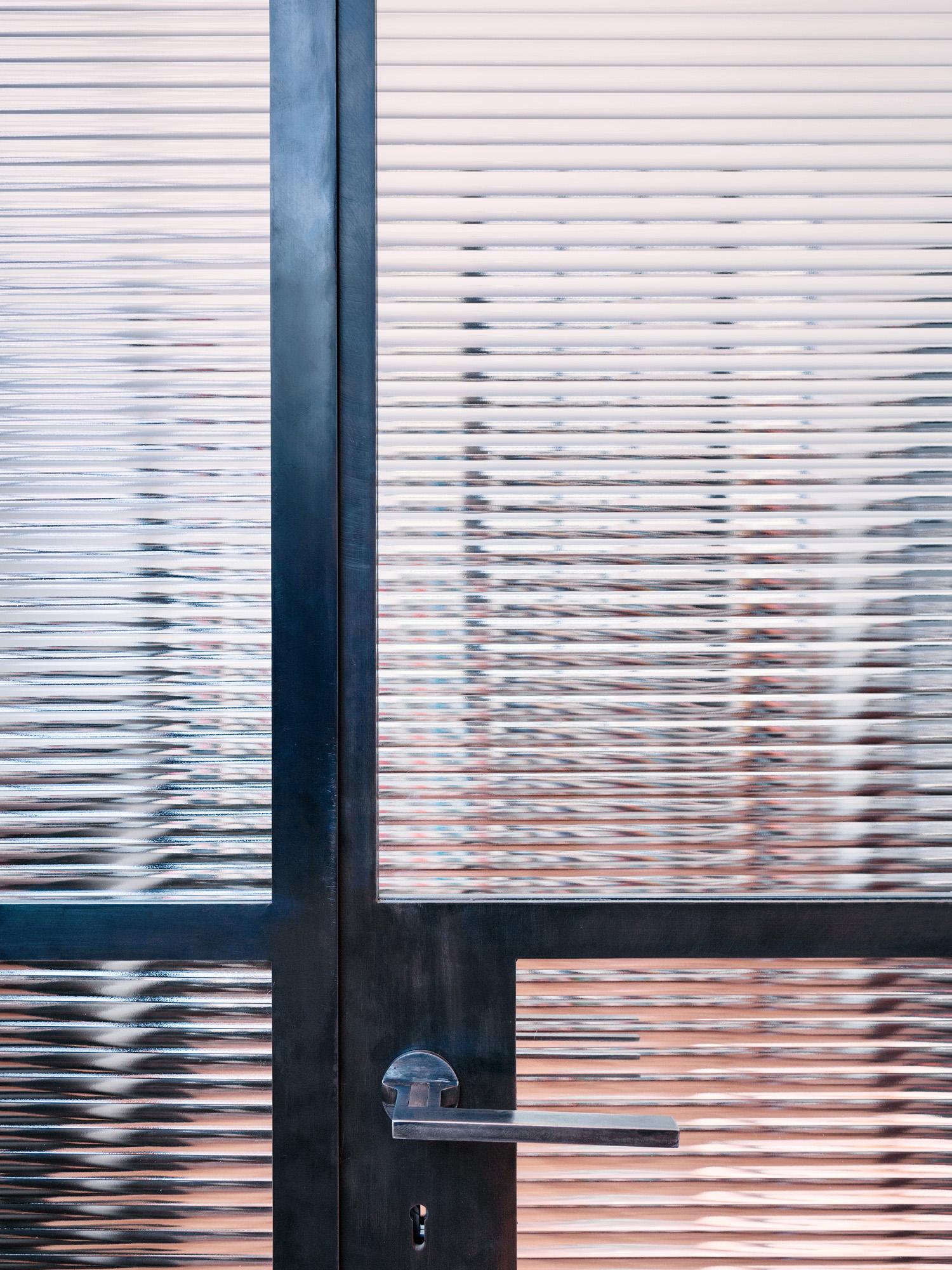 Modern residential staircase with glass